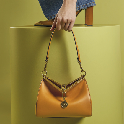Orange Vela bag - link to Vela Bags 
