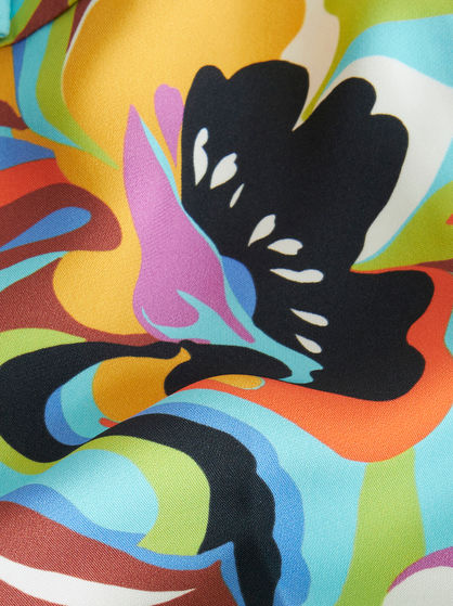 TAILORED TROUSERS WITH MAXI FLORAL PATTERNS