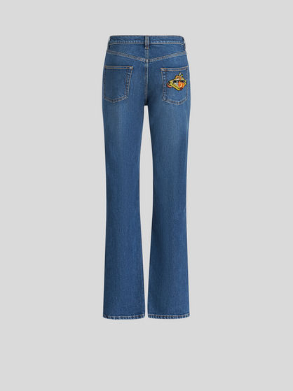 DENIM JEANS WITH EMBROIDERED PATCH