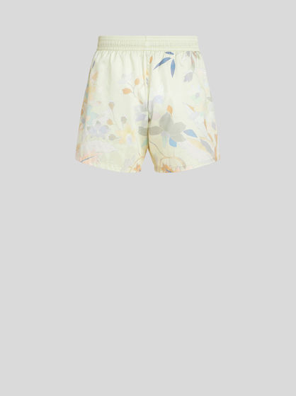 COSTUME WITH LEAFY FLORAL PRINT