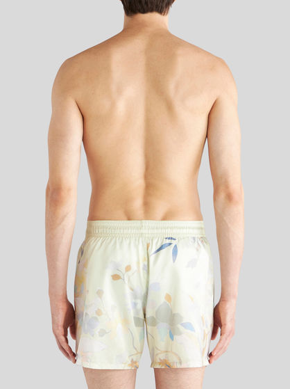 COSTUME WITH LEAFY FLORAL PRINT