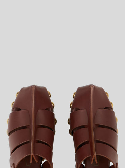 LEATHER CLOGS WITH STRAP