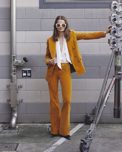 Model wearing Etro DOUBLE-BREASTED VELVET JACKET, trousers and Etro sunglasses