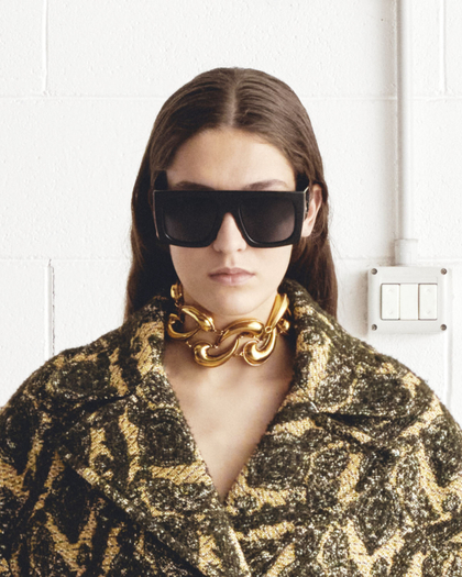 Woman wearing a a pair of Etroscreen SUNGLASSES and a paisley chocker