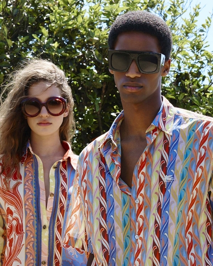 Woman and man wearing a a pair of Etro SUNGLASSES and a bikini from the ETRO summer collection- link to woman's sunglasses