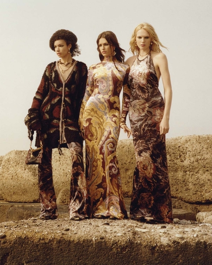 FW24 ADV fashion campaign - womens on a cliff wearing dresses from the FW24 fashion show collection