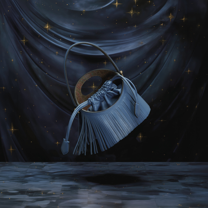 Blue Saturno bag in the space - SS24 ADV campaing 