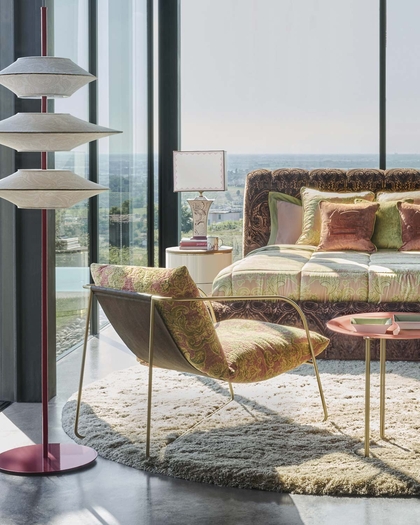 Luxurious living room featuring Etro Home Collection furniture and decor, blending vibrant patterns with elegant design.