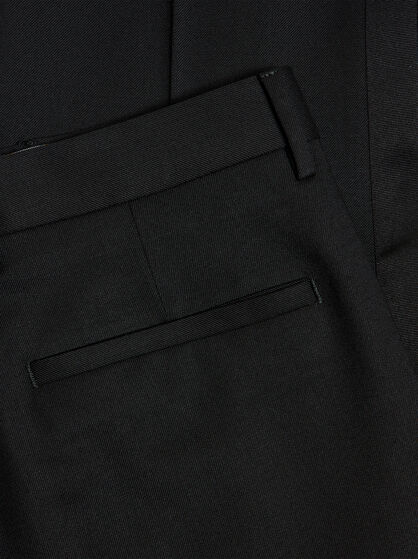 SLIM-FIT TROUSERS WITH SILK DETAILS