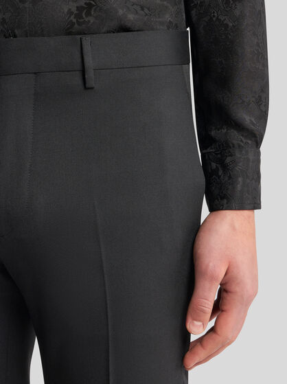 SLIM-FIT TROUSERS WITH SILK DETAILS