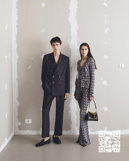 A Man and a woman standing still in an empty room wearing some pieces from the FW24 ETRO collection