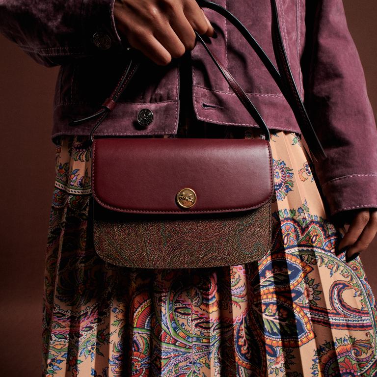 Detail-showing-an- ETRO Essential-bag-with-Paisley-pattern-and-contrasting-Burgundy-flap.