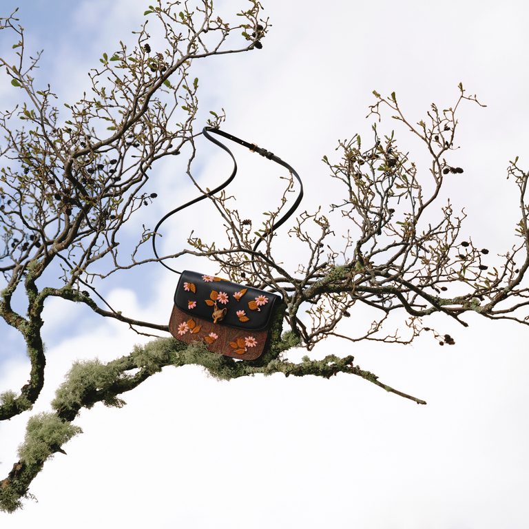 Essential-bag-on-a-tree-with-embroided-flowers-and-a-fox-head