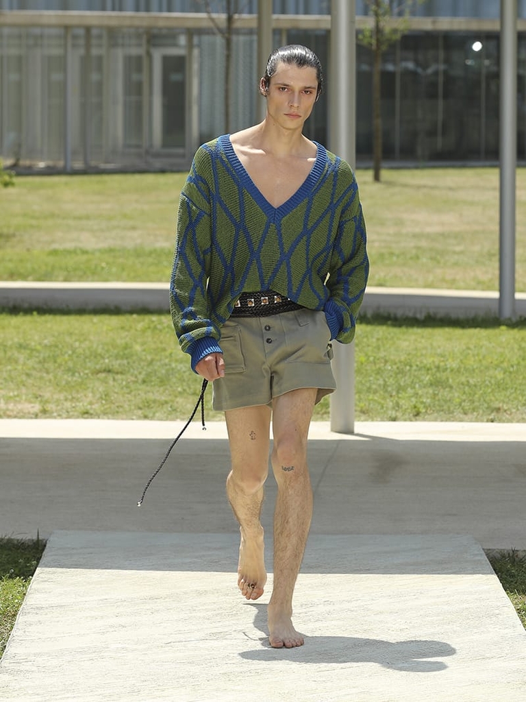 Etro Man Fashion Show SS23; Green Sweater With Light Blue Edges and Green Short With Pockets