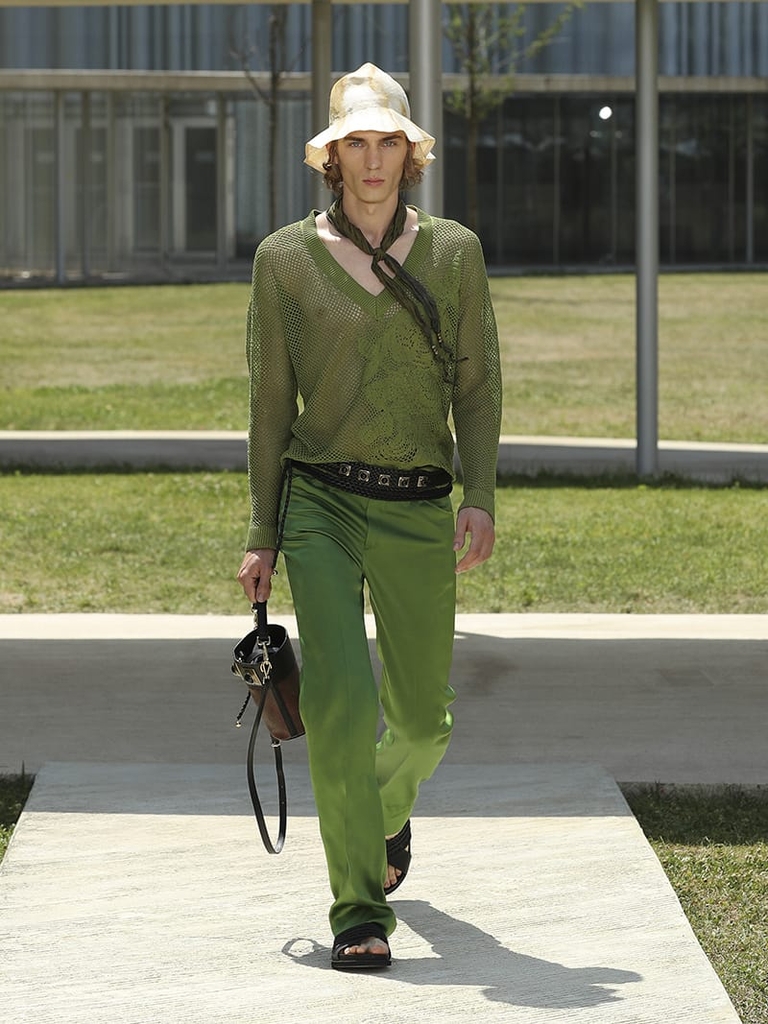Etro Man Fashion Show SS23; Green Trousers and Green Mesh, accompanied by Large Crown Me Shopping Bag and Raffia Hat