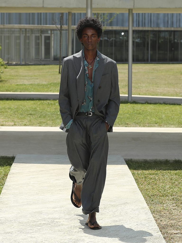 Etro Man Fashion Show SS23; Striped Double-Breasted Jacket and Trousers, Silk Shirt With Archive Floral Print accompanied by Leather Belt With Mini Stud