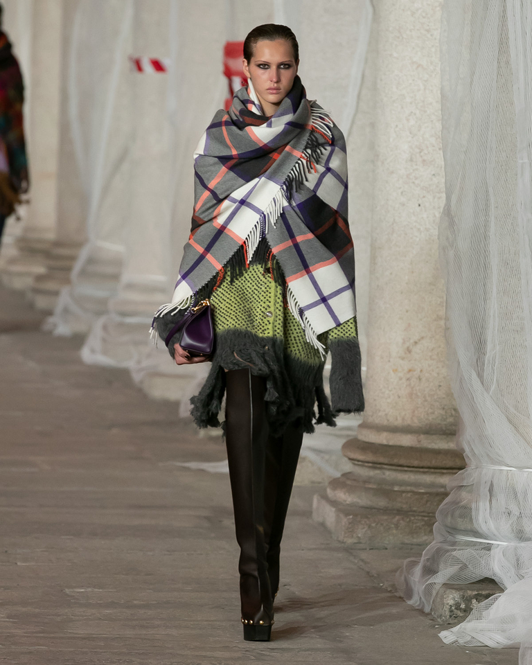 Model with multicoloured scarf, green jacket and handbag catwalk Etro fall winter 2023 woman