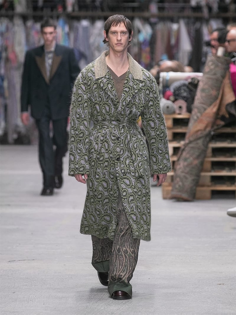 Model with green long coat fashion show collection Etro fall winter 2023/2024
