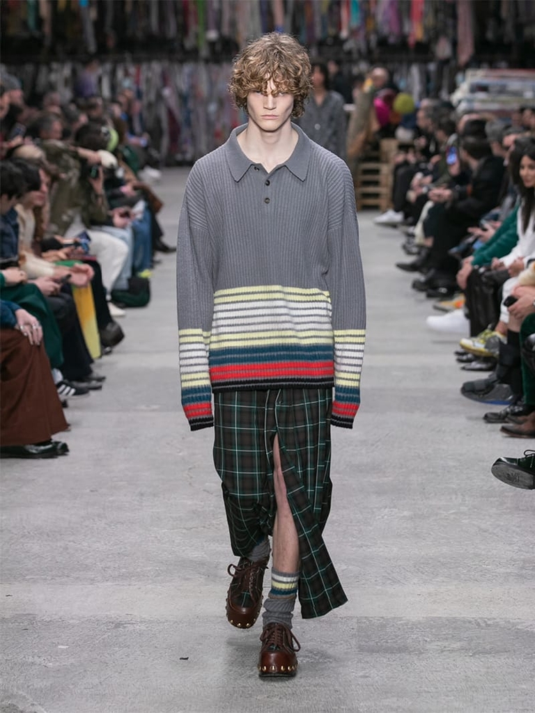 Model with striped long polo shirt and long skirt Etro fashion show fall winter collection 2023/2024