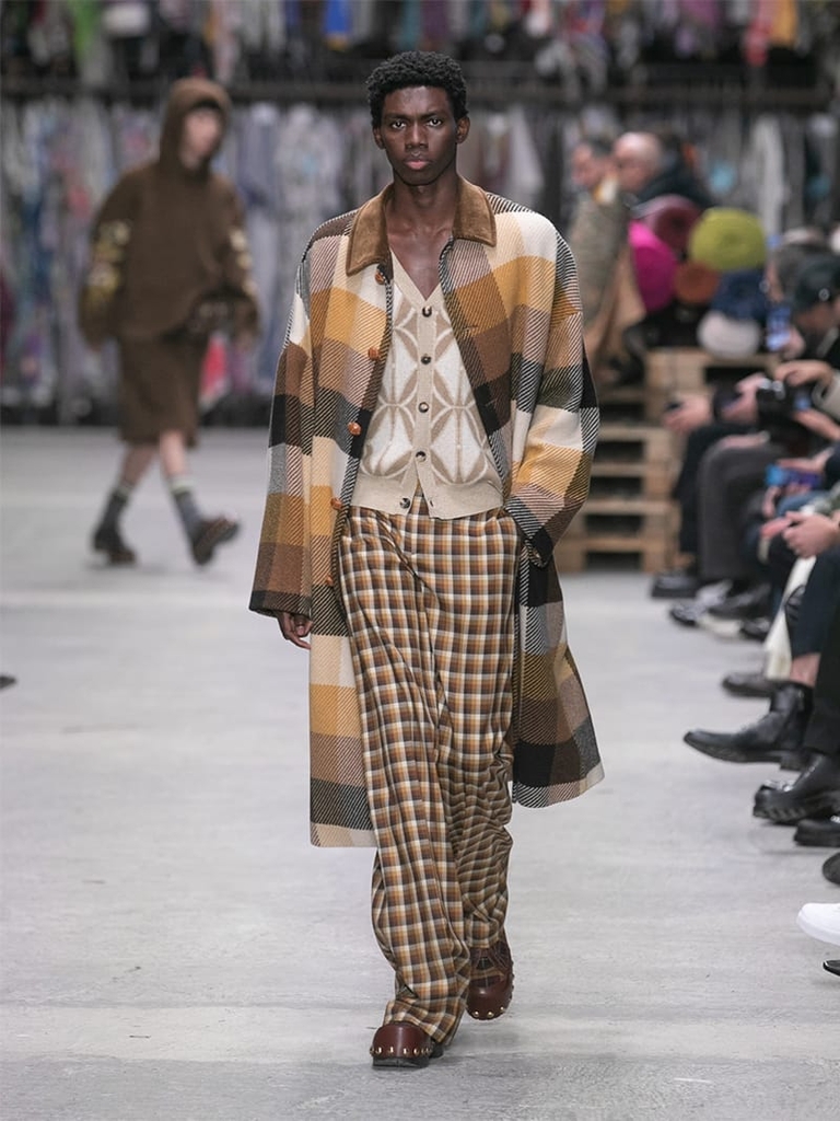 Model with checked jacket, cardigan and trousers Etro fashion show fall winter collection 2023/2024