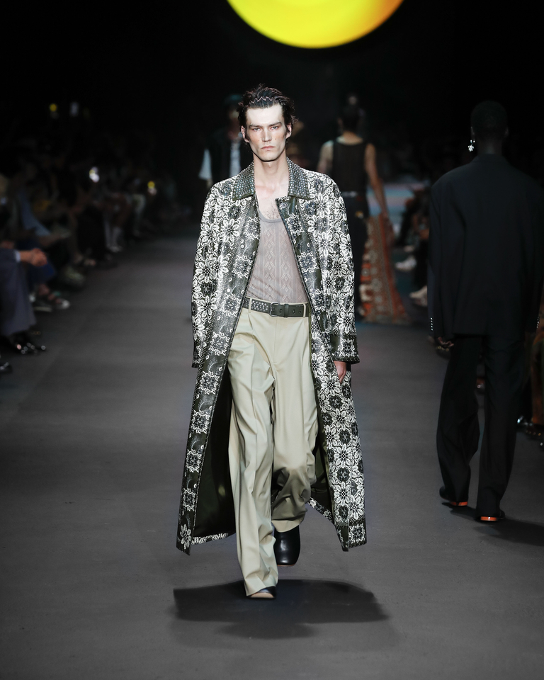 Model with long jacket with floral patterns and grey transparent vest Etro Spring Summer collection 2024 fashion show